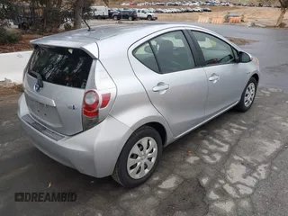 2014 Toyota Prius One with VIN JTDKDTB33E1067408, listed as a IAAI auction lot 41573895 with 245,383 mi miles and . Bid and sale history available at DreamBid. Image 4.