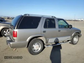 2000 GMC Jimmy SL with VIN 1GKCS13W9Y2341317, listed as a Copart auction lot 43249705 with 160,889 mi miles and Clean Title. Bid and sale history available at carsss.com. Image 3.