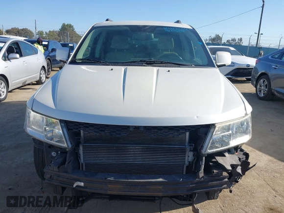 2012 Dodge Journey SXT z VIN 3C4PDCBG7CT374496, wystawiony jako IAAI lot #42317000 z przebiegiem 149 029 mil mil oraz . Historia ofert i sprzedaży dostępna na DreamBid. Obrazek 6.