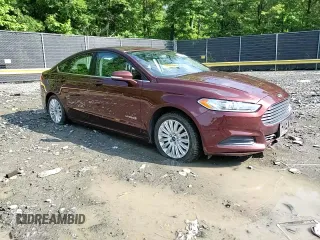 2016 Ford Fusion SE Hybrid z VIN 3FA6P0LU5GR377735, wystawiony jako Copart lot #58791955 z przebiegiem 135 798 mil mil oraz Szkoda całkowita • Salvage title. Historia ofert i sprzedaży dostępna na DreamBid. Obrazek 13.