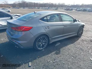 2018 Hyundai Elantra Sport with VIN KMHD04LB8JU561462, listed as a IAAI auction lot 40848718 with 107,618 mi miles. Bid and sale history available at carsss.com. Image 4.