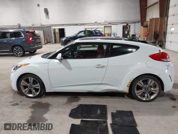 2012 Hyundai Veloster w/Black Int with VIN KMHTC6AD3CU080878, listed as a IAAI auction lot 42377636 with 152,430 mi miles and . Bid and sale history available at DreamBid. Image 14.