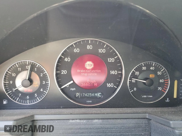 2004 Mercedes-Benz E 320 with VIN WDBUF65J24A430955, listed as a Copart auction lot 52821835 with 174,254 mi miles and Salvage Title. Bid and sale history available at carsss.com. Image 9.