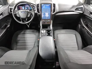 2021 Ford Edge SE z VIN 2FMPK4G95MBA23228, wystawiony jako Copart lot #51947405 z przebiegiem 80 522 mil mil oraz Czysty tytuł • Clean title. Historia ofert i sprzedaży dostępna na DreamBid. Obrazek 8.