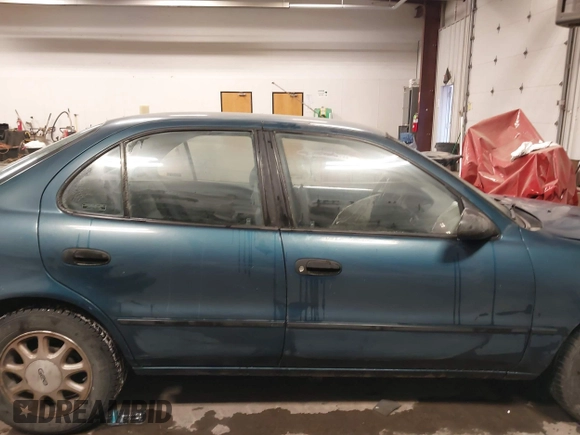 1994 Geo Prizm z VIN 1Y1SK5380RZ081863, wystawiony jako IAAI lot #41489263 z przebiegiem 124 256 mil mil oraz . Historia ofert i sprzedaży dostępna na DreamBid. Obrazek 13.
