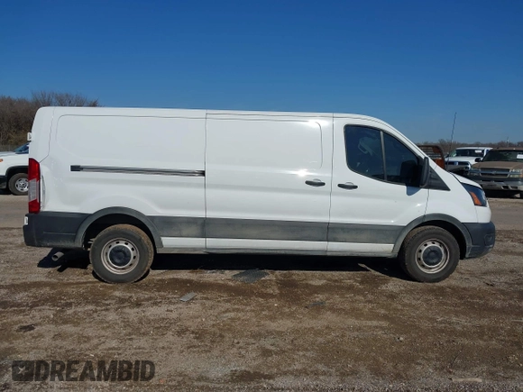 2022 Ford Transit Cargo with VIN 1FTYE1YG3NKA77243, listed as a IAAI auction lot 41231977 with 55,300 mi miles and . Bid and sale history available at DreamBid. Image 13.