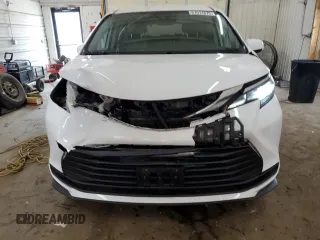 2021 Toyota Sienna LE z VIN 5TDKSKFC7MS023634, wystawiony jako Copart lot #61914675 z przebiegiem 87 980 mil mil oraz Szkoda całkowita • Salvage title. Historia ofert i sprzedaży dostępna na DreamBid. Obrazek 5.