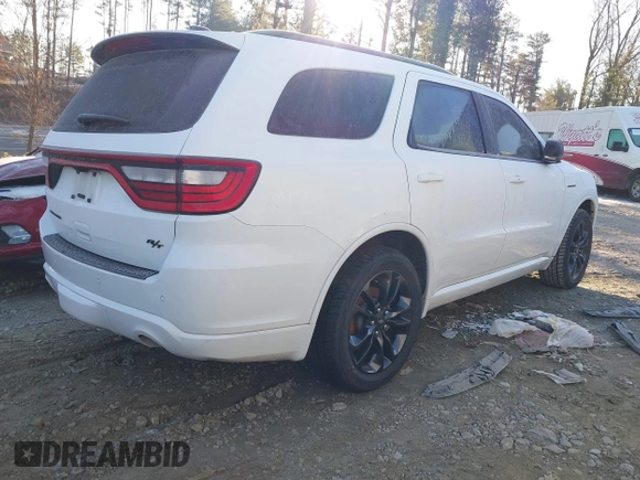2023 Dodge Durango R/T Plus z VIN 1C4SDHCTXPC567522, wystawiony jako IAAI lot #41339712 z przebiegiem 55 386 mil mil oraz . Historia ofert i sprzedaży dostępna na DreamBid. Obrazek 4.