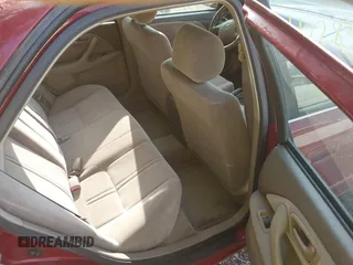 1998 Toyota Camry LE z VIN JT2BG22K4W0206938, wystawiony jako IAAI lot #42283640 z przebiegiem 153 365 mil mil oraz . Historia ofert i sprzedaży dostępna na DreamBid. Obrazek 8.