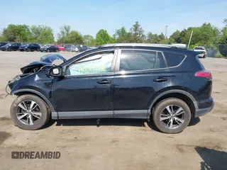 2018 Toyota RAV4 XLE with VIN 2T3WFREVXJW484872, listed as a IAAI auction lot 42144810 with Not provided miles and . Bid and sale history available at DreamBid. Image 15.