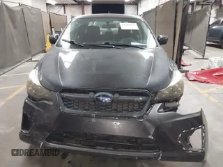 2014 Subaru Impreza Premium with VIN JF1GJAD65EH005774, listed as a IAAI auction lot 42282759 with 134,632 mi miles and . Bid and sale history available at DreamBid. Image 12.