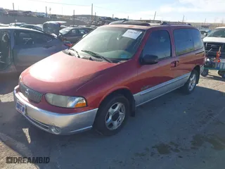 1999 Nissan Quest GXE with VIN 4N2XN11TXXD838700, listed as a IAAI auction lot 41867853 with 173,909 mi miles. Bid and sale history available at carsss.com. Image 2.