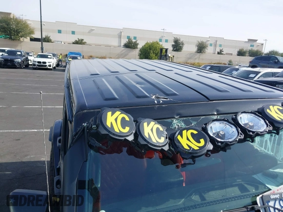 2022 Jeep Wrangler Unlimited Rubicon with VIN 1C4HJXFN0NW242903, listed as a IAAI auction lot 41448636 with 28,007 mi miles and . Bid and sale history available at DreamBid. Image 14.