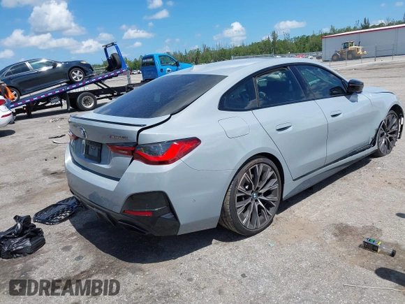 2023 BMW 4 Series M440i z VIN WBA63AW0XPFP50556, wystawiony jako IAAI lot #42517241 z przebiegiem 33 079 mil mil oraz . Historia ofert i sprzedaży dostępna na DreamBid. Obrazek 4.
