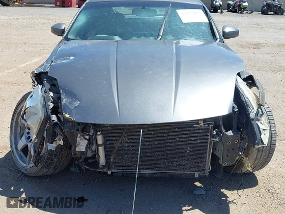 2004 Nissan 350Z Touring z VIN JN1AZ34E94M155097, wystawiony jako IAAI lot #42273474 z przebiegiem Nie podano mil oraz . Historia ofert i sprzedaży dostępna na DreamBid. Obrazek 6.