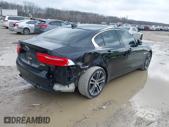 2017 Jaguar XE 35t Premium with VIN SAJAJ4BVXHA972195, listed as a IAAI auction lot 41694337 with 71,239 mi miles. Bid and sale history available at carsss.com. Image 4.