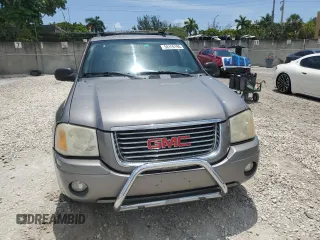 2006 GMC Envoy SLE z VIN 1GKDT13S262271445, wystawiony jako Copart lot #58196195 z przebiegiem 129 902 mil mil oraz Szkoda całkowita • Salvage title. Historia ofert i sprzedaży dostępna na DreamBid. Obrazek 5.