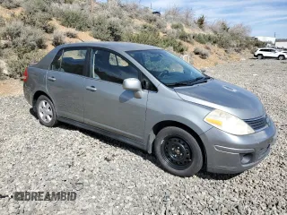 2007 Nissan Versa 1.8 S with VIN 3N1BC11E17L446450, listed as a Copart auction lot 52631415 with 121,006 mi miles and Salvage Title. Bid and sale history available at carsss.com. Image 4.