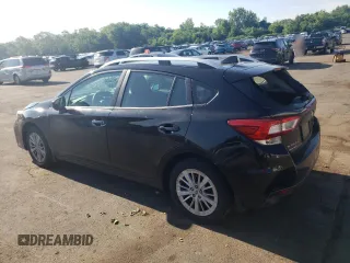 2018 Subaru Impreza Premium with VIN 4S3GTAB68J3739274, listed as a Copart auction lot 62193185 with 58,518 mi miles and Salvage title. Bid and sale history available at DreamBid. Image 2.