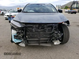2023 Subaru Solterra Premium z VIN JTMABABA8PA009866, wystawiony jako Copart lot #67385543 z przebiegiem 2496 mil mil oraz . Historia ofert i sprzedaży dostępna na DreamBid. Obrazek 5.