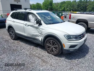2018 Volkswagen Tiguan SEL with VIN 3VV2B7AX3JM036157, listed as a IAAI auction lot 42506274 with 102,947 mi miles and . Bid and sale history available at DreamBid. Image 1.