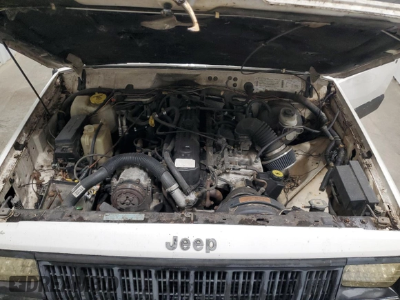 1996 Jeep Cherokee Sport with VIN 1J4FJ68S5TL235927, listed as a Copart auction lot 68942174 with 238,619 mi miles and Clean Title. Bid and sale history available at carsss.com. Image 12.