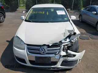 2008 Volkswagen Jetta S with VIN 3VWJZ71K08M131499, listed as a IAAI auction lot 42431708 with 90,512 mi miles and . Bid and sale history available at DreamBid. Image 12.