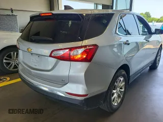 2020 Chevrolet Equinox LT with VIN 2GNAXJEV0L6236404, listed as a IAAI auction lot 42619695 with 77,124 mi miles and . Bid and sale history available at DreamBid. Image 19.