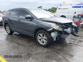 2015 Mazda CX-9 Touring with VIN JM3TB2CA9F0469529, listed as a IAAI auction lot 41975992 with 95,280 mi miles. Bid and sale history available at carsss.com. Image 1.