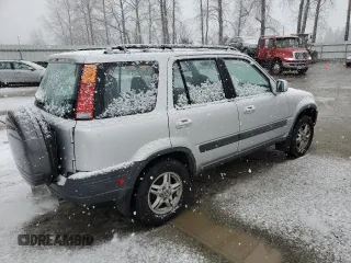 1999 Honda CR-V EX with VIN JHLRD1764XC084847, listed as a Copart auction lot 44084255 with 203,271 mi miles and Clean Title. Bid and sale history available at carsss.com. Image 3.
