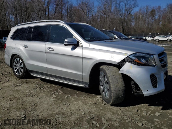 2019 Mercedes-Benz GLS 450 with VIN 4JGDF6EE8KB233053, listed as a Copart auction lot 49957755 with 68,676 mi miles and Salvage title. Bid and sale history available at DreamBid. Image 4.