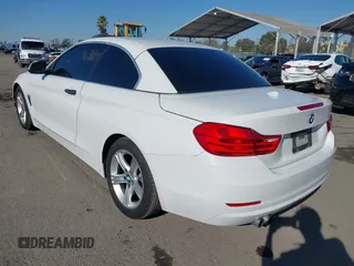 2014 BMW 4 Series 428i with VIN WBA3V7C54EP770552, listed as a IAAI auction lot 41297640 with 114,763 mi miles and . Bid and sale history available at DreamBid. Image 3.