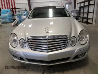 2007 Mercedes-Benz E 550 with VIN WDBUF72X97B017766, listed as a Copart auction lot 48523515 with 299,578 mi miles and Salvage Title. Bid and sale history available at DreamBid. Image 5.