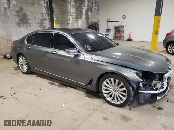 2018 BMW 7 Series 740i xDrive with VIN WBA7E4C5XJGV24275, listed as a Copart auction lot 48987063 with 48,864 mi miles. Bid and sale history available at carsss.com. Image 4.