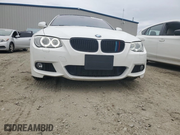 2012 BMW 3 Series 335i with VIN WBAKG7C58CE803258, listed as a Copart auction lot 71809764 with 73,376 mi miles and Salvage Title. Bid and sale history available at carsss.com. Image 5.