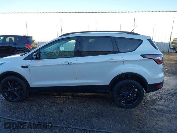 2017 Ford Escape Titanium with VIN 1FMCU9J93HUE96611, listed as a IAAI auction lot 41546906 with 90,586 mi miles. Bid and sale history available at carsss.com. Image 14.