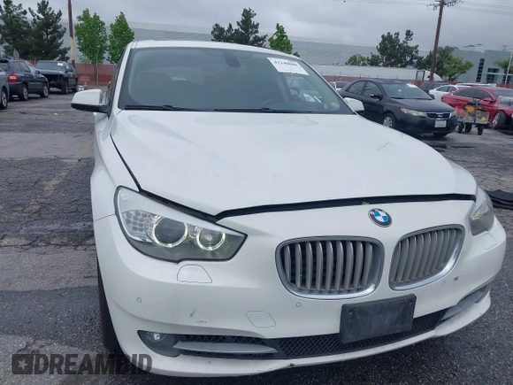 2011 BMW 5 Series GT 550i with VIN WBASN4C59BC210040, listed as a IAAI auction lot 42140088 with 130,771 mi miles. Bid and sale history available at carsss.com. Image 6.