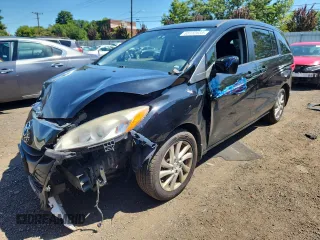 2012 Mazda 5 Sport with VIN JM1CW2BL4C0141169, listed as a Copart auction lot 65132635 with 129,987 mi miles and Salvage title. Bid and sale history available at DreamBid. Image 1.
