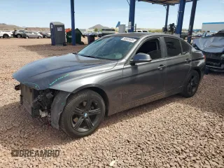 2015 BMW 3 Series 320i with VIN WBA3B1G59FNT01695, listed as a Copart auction lot 50655635 with 133,405 mi miles and Salvage Title. Bid and sale history available at carsss.com. Image 1.