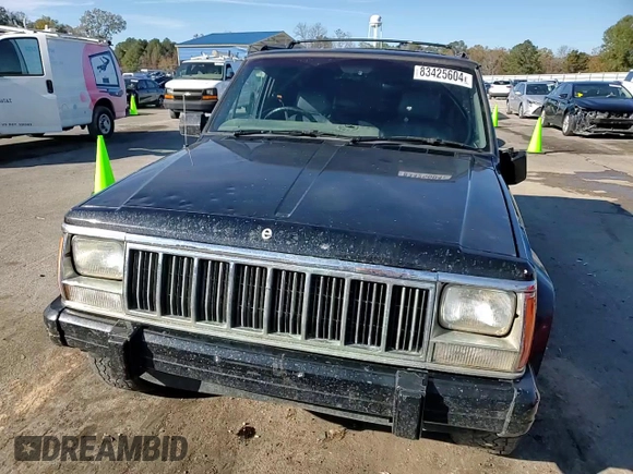 1996 Jeep Cherokee z VIN 1J4FN78S8TL160974, wystawiony jako Copart lot #83425604 z przebiegiem 336 313 mil mil oraz Szkoda całkowita • Salvage title. Historia ofert i sprzedaży dostępna na DreamBid. Obrazek 11.
