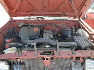 1992 Nissan Frontier z VIN 1N6SD11S0NC356308, wystawiony jako Copart lot #55831745 z przebiegiem 327 113 mil mil oraz Szkoda całkowita • Salvage title. Historia ofert i sprzedaży dostępna na DreamBid. Obrazek 11.