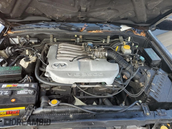 2001 Infiniti QX4 with VIN JNRDR09X21W204207, listed as a Copart auction lot 79935604 with Not Provided miles and Salvage Title. Bid and sale history available at DreamBid. Image 12.