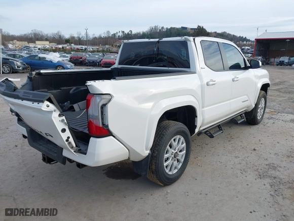 2024 Toyota Tacoma 4WD SR5 with VIN 3TYLB5JN0RT016910, listed as a IAAI auction lot 41586142 with 6,127 mi miles. Bid and sale history available at carsss.com. Image 4.