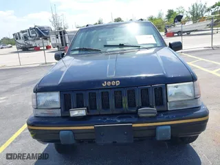 1995 Jeep Grand Cherokee Limited with VIN 1J4GZ78Y0SC578277, listed as a IAAI auction lot 42082848 with 174,288 mi miles. Bid and sale history available at carsss.com. Image 6.