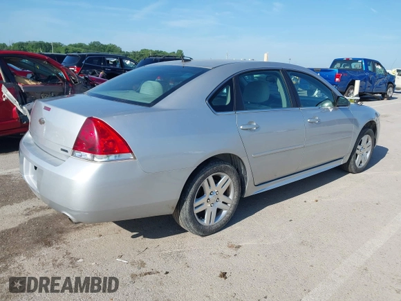 2014 Chevrolet Impala LT with VIN 2G1WB5E31E1180713, listed as a IAAI auction lot 42543751 with 263,010 mi miles and . Bid and sale history available at DreamBid. Image 4.