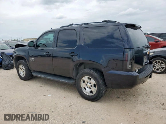 2014 Chevrolet Tahoe LT with VIN 1GNSCBE07ER215101, listed as a Copart auction lot 59045195 with 72,710 mi miles and Salvage title. Bid and sale history available at DreamBid. Image 2.