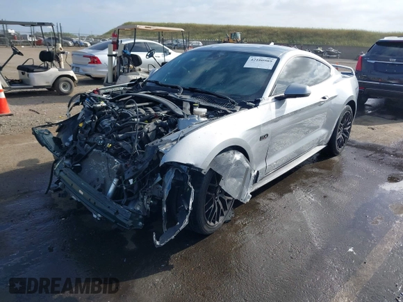 2021 Ford Mustang GT z VIN 1FA6P8CF3M5117977, wystawiony jako IAAI lot #42100989 z przebiegiem 13 557 mil mil oraz . Historia ofert i sprzedaży dostępna na DreamBid. Obrazek 2.