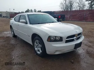 2010 Dodge Charger SXT with VIN 2B3CA3CV5AH127599, listed as a IAAI auction lot 38546544 with 226,624 mi miles. Bid and sale history available at carsss.com. Image 1.
