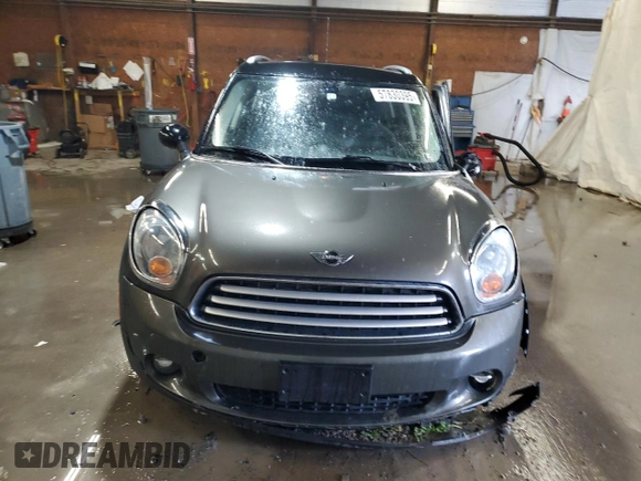 2014 MINI Countryman with VIN WMWZB3C59EWR42124, listed as a Copart auction lot 57830395 with 125,000 mi miles and Salvage title. Bid and sale history available at DreamBid. Image 5.