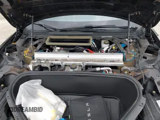 2022 Tesla Model S with VIN 5YJSA1E51NF472152, listed as a IAAI auction lot 42625943 with 60,290 mi miles and . Bid and sale history available at DreamBid. Image 10.